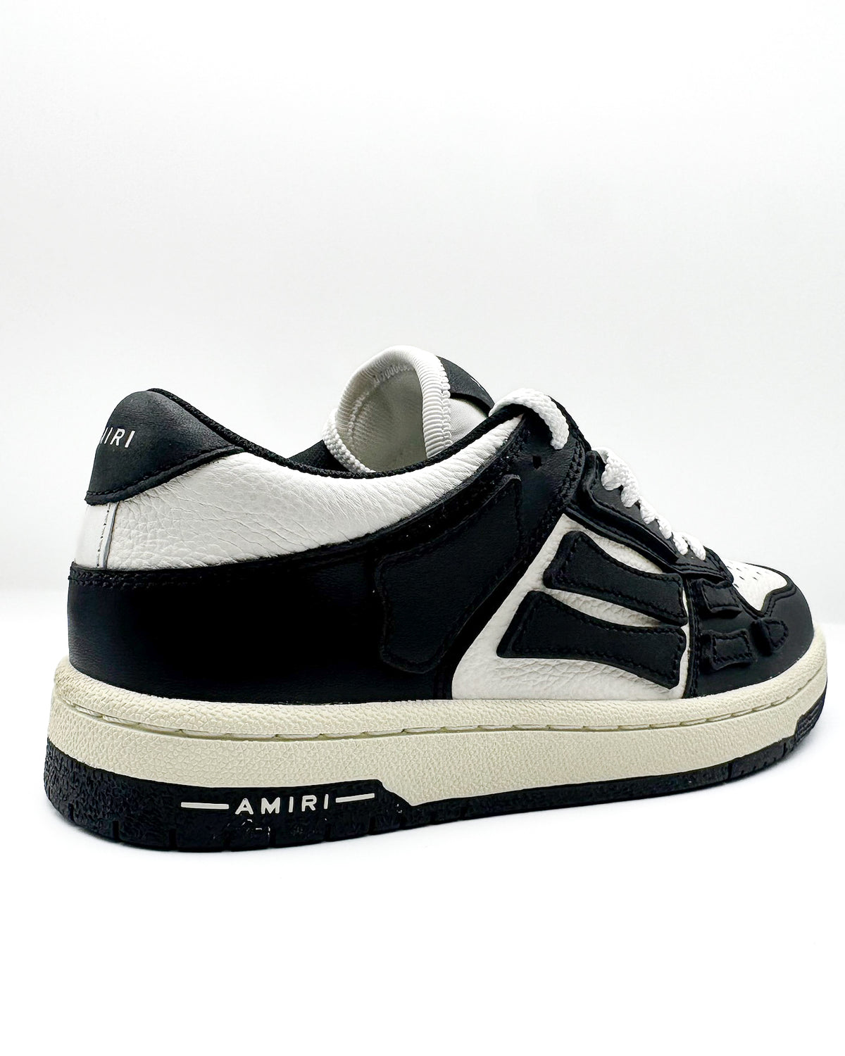 Amiri Calzado Skel Top Low Black/White · Premium Avenue